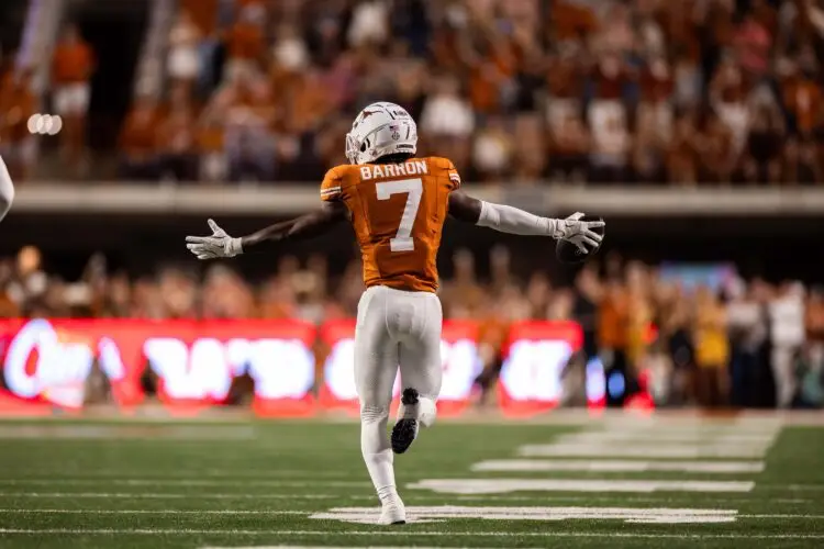 Oct 19, 2024; Austin, Texas, USA; Texas Longhorns cornerback Jahdae Barron (7) celebrates an interception in the first quarter against the Georgia Bulldogs at Darrell K Royal-Texas Memorial Stadium. Mandatory Credit: Brett Patzke-Imagn Images
