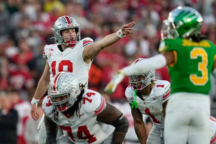 Ohio State quarterback Will Howard (18) motions during the second half of the College Football Playoff quarterfinal against the Oregon at the Rose Bowl in Pasadena, Calif. on Jan. 1, 2025.