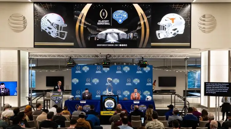Ohio State Buckeyes Head Coach Ryan Day, left, and Texas Longhorns Head Coach Steve Sarkisian speak during the Coaches' Press Conference at AT&T Stadium, Jan. 9, 2024. Both coaches answered questions from the media during the conference, and will face each other in the Cotton Bowl College Football Playoff semi-final game on Friday. Photo: Sara Diggins/American-Statesman / USA TODAY NETWORK via Imagn Images