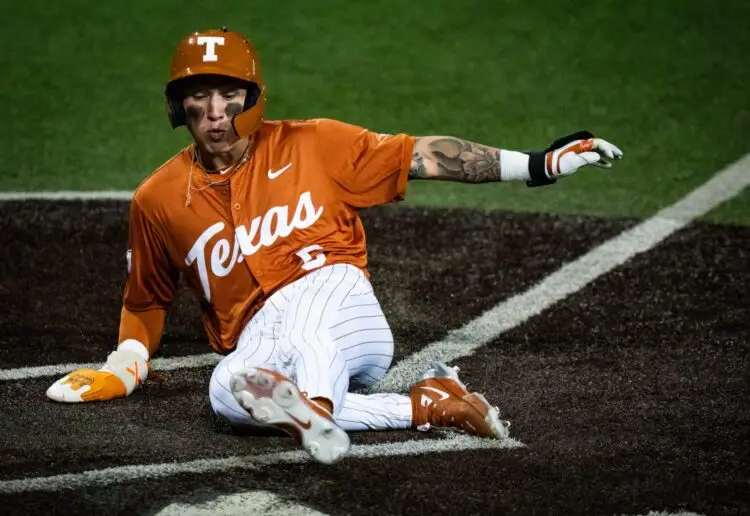 Texas Longhorns infielder Ethan Mendoza (5) slides home to score the first run of the game for the Longhorns in the first inning as the Texas Longhorns take on the University of the Incarnate Word Cardinals at UFCU Disch-Falk Field in Austin, Feb. 25, 2025. Photo: Sara Diggins/American-Statesman / USA TODAY NETWORK via Imagn Images