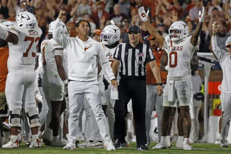 Oct 25, 2025; Starkville, Mississippi, USA; Texas Longhorns head coach Steve Sarkisian reacts after a touchdown during overtime against the Mississippi State Bulldogs at Davis Wade Stadium at Scott Field. Mandatory Credit: Petre Thomas-Imagn Images
