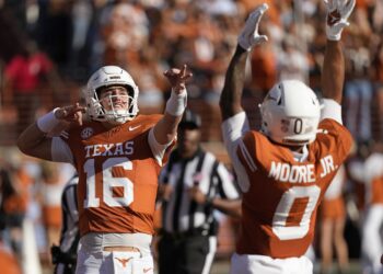 No. 17 Texas rides Razorbacks to massive 52-37 win