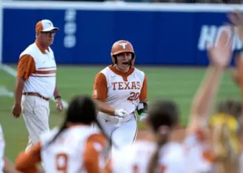 Texas Routs Texas Tech 7-3 in WCWS Finals Opener