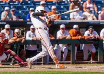 Longhorns eliminate Crimson Tide 14-2 as Rodriguez delivers rare MCWS cycle