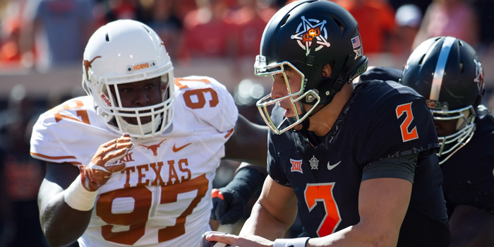 Oklahoma Sate defeats Texas 49-31