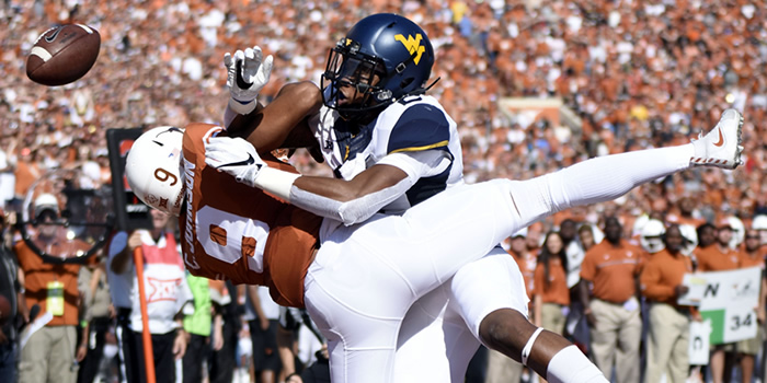 Out of Reach: West Virginia Tops Texas 24-20