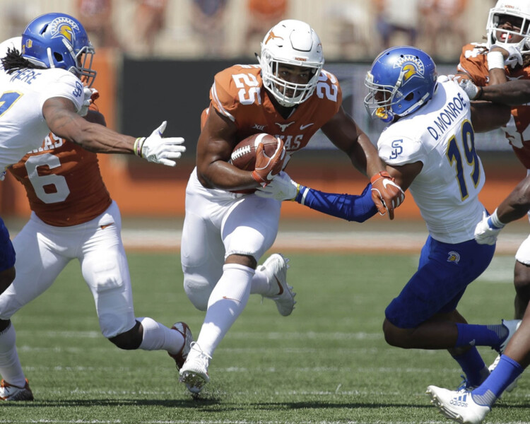 Texas Rushing Attack Delivers 56-0 Rout of Spartans