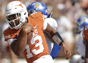 Game photos from the 56-0 Texas victory over San Jose State