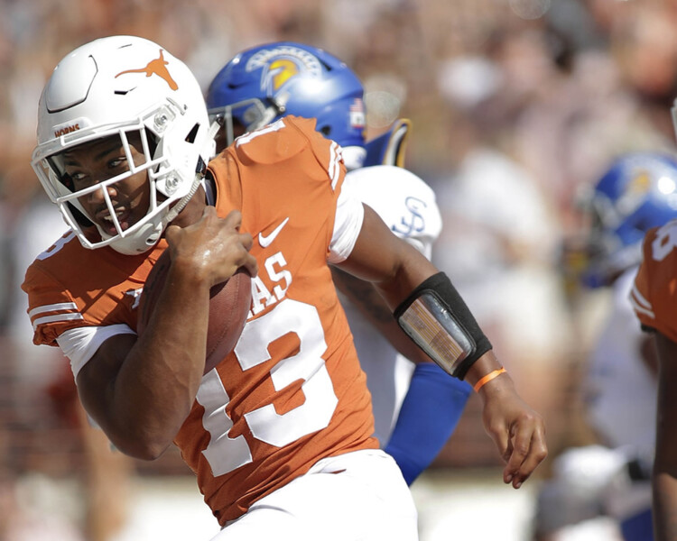 Game photos from the 56-0 Texas victory over San Jose State