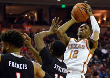 Longhorns defeat #8 Red Raiders 67-58