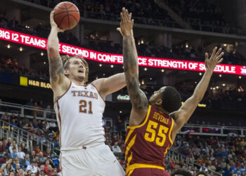 Photos from the Longhorns’ 68-64 win over Iowa State in the first-round of the Big 12 Tournament
