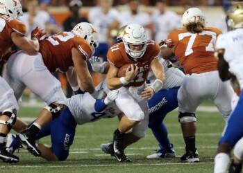 Texas hangs on, tops Tulsa 28-21