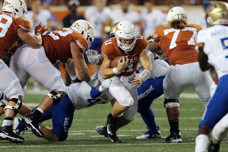 Texas hangs on, tops Tulsa 28-21