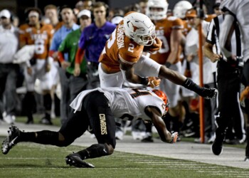 Longhorns end skid to Cowboys with 36-30 win