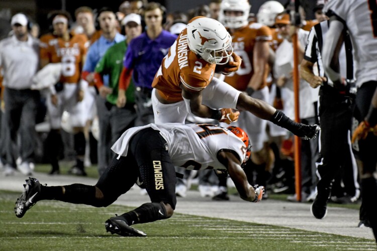 Longhorns end skid to Cowboys with 36-30 win