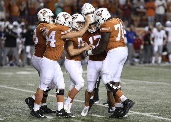 Cameron Dicker saves the day as Longhorns avoid potential disaster against Kansas