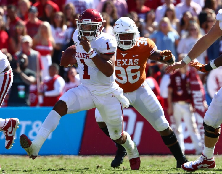 Hurts, Lamb power Oklahoma to sloppy Red River win over Texas