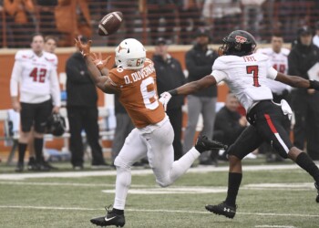 Longhorns romp Red Raiders 49-24 on Senior Day, end regular season 7-5