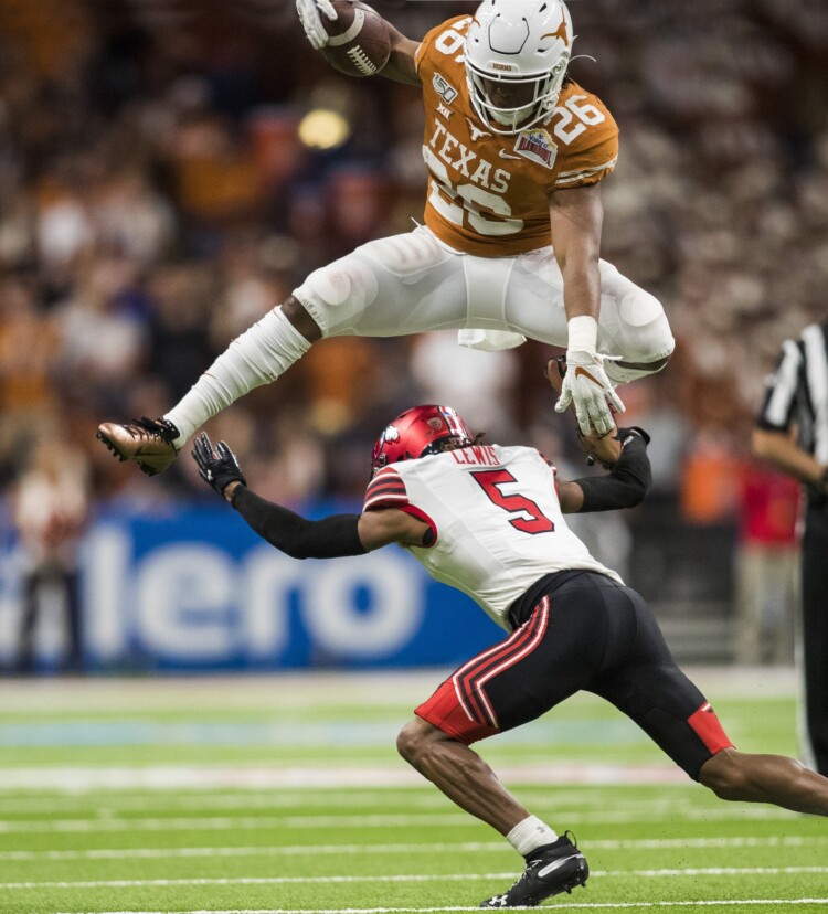 Texas uses strong defensive performance to power over #11 Utah