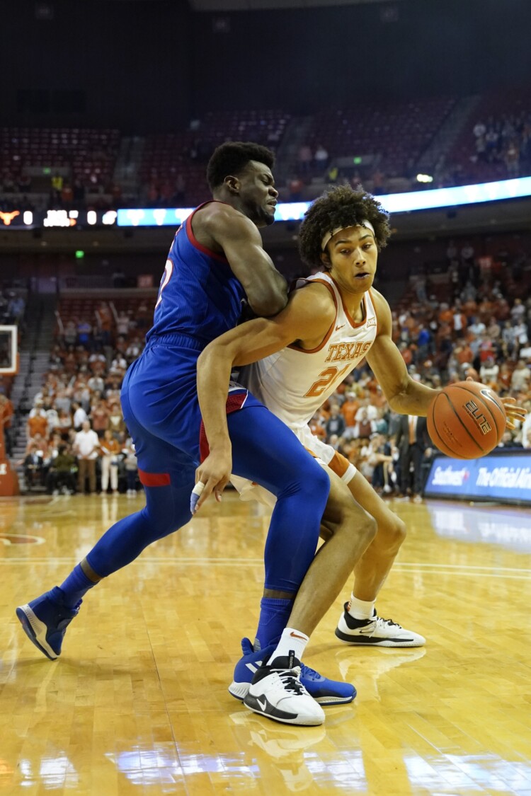Texas starts strong, fades down the stretch in 66-57 loss to Kansas