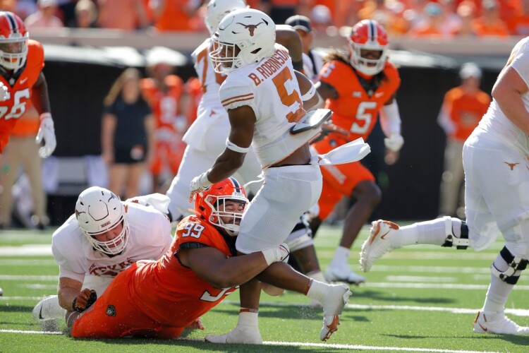 Road Woes Continue:  #11 Oklahoma State deals Sarkisian, #20 Texas 41-34 loss