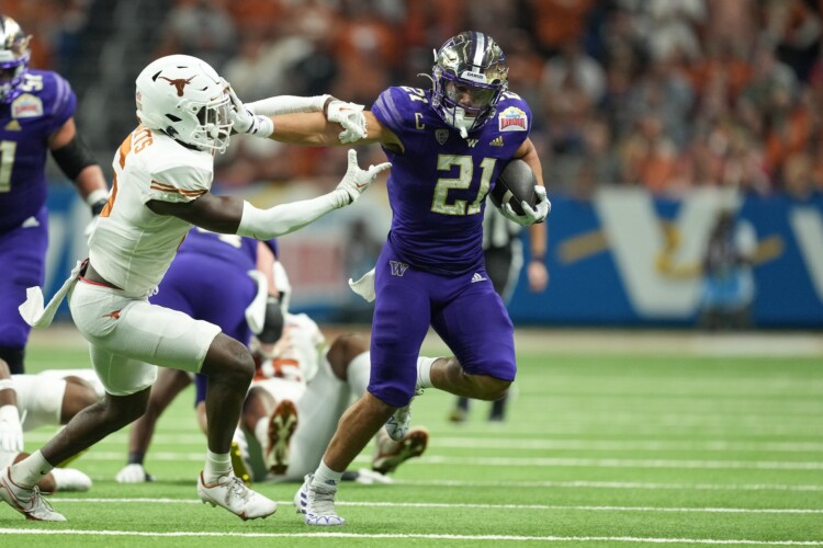 No. 20 Texas drops chances, falls 27-20 to No. 12 Washington